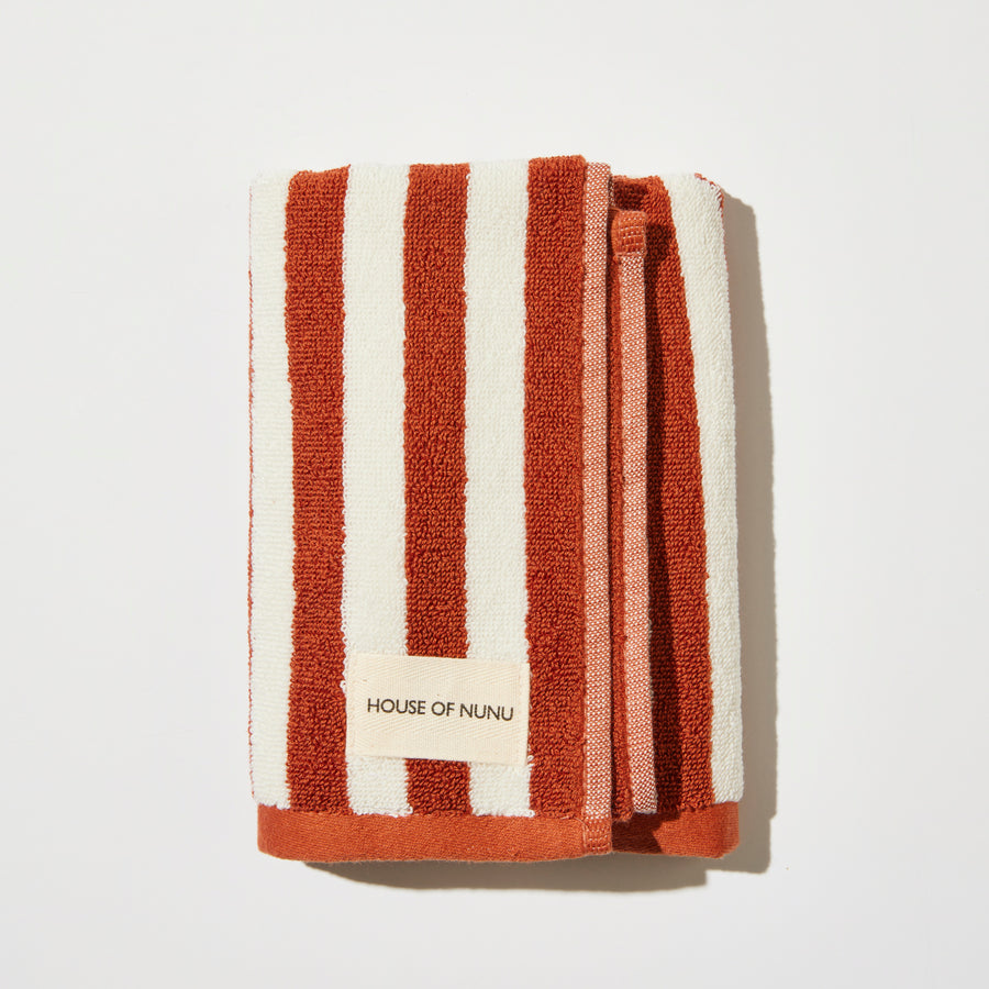 HAND TOWEL IN RED OCHRE STRIPE