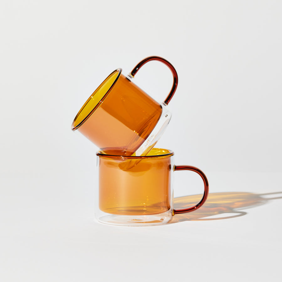 DOUBLE TROUBLE CUP SET IN AMBER