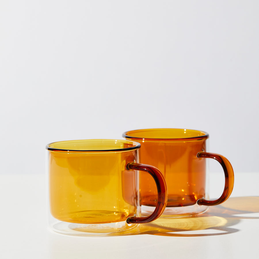 DOUBLE TROUBLE CUP SET IN AMBER